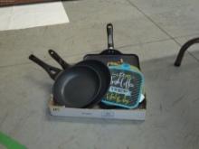 kitchen lot, lot of frying pans and hot pads