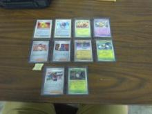 pokemon cards, lot of 10 english holographic cards in hard top loaders