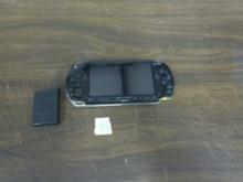 PSP, sony handheld gaming device with battery pack