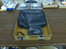 leather travel bags, large basic toiletry bag and a tasco camera/money bag both in very nice shape