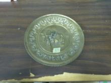 vintage peerage brass embossed wall plate, made in england its 12in across with village scene