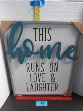 Wall Art, "This Home Runs on Love & Laughter, appears new