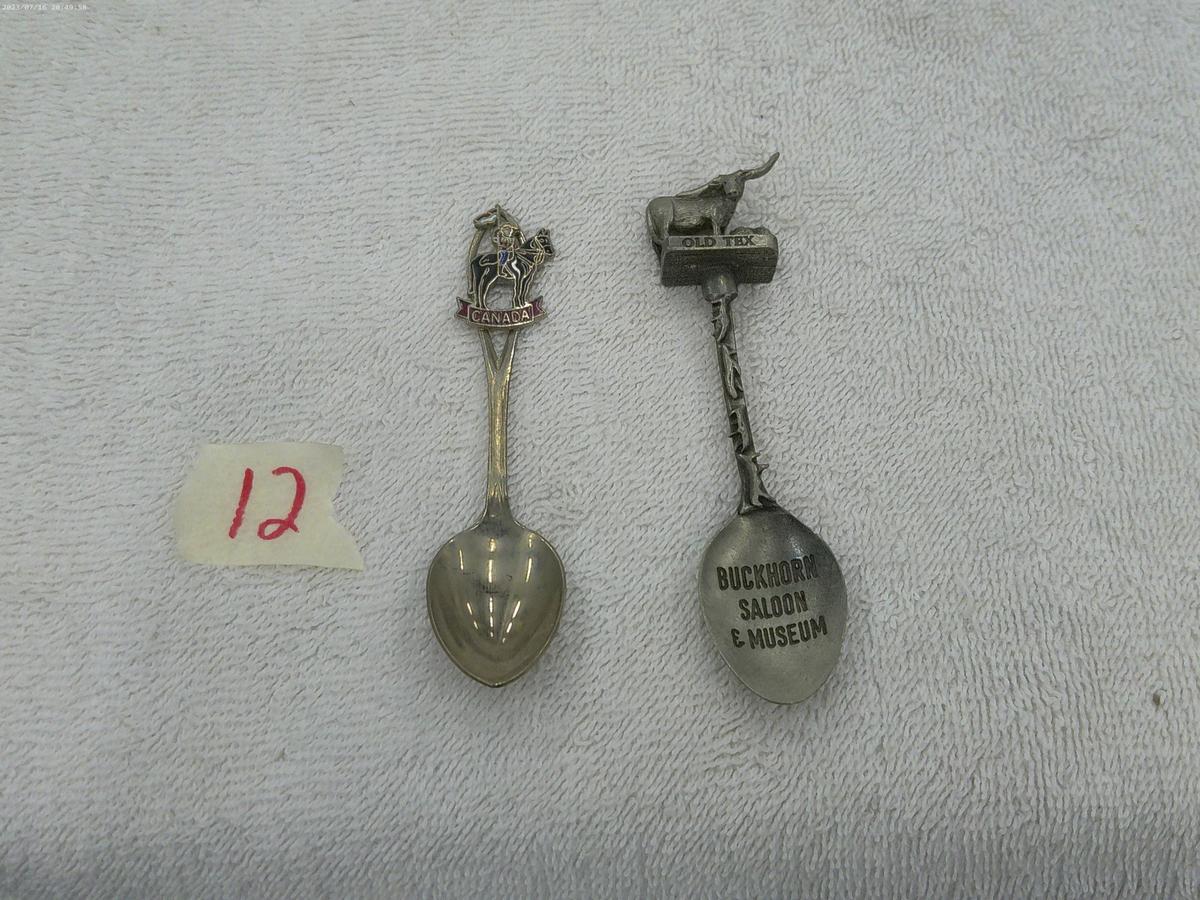 collector spoons, one from texas made in england and one from canada made in canada