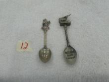 collector spoons, one from texas made in england and one from canada made in canada