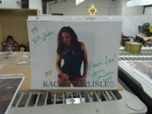 signed professional wrestling photo, by pro female wrestler kacee carlisle in protective sleeve