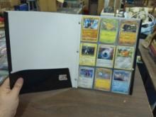 pokemon cards, folder full of cards