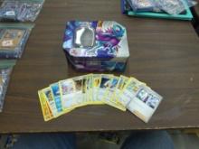 pokemon lot, metal collectors tin from 2024 and 25 cards