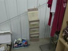 hanging storage, has 5 large pockets and 2 small clear ones at the top 47in tall and 12in wide