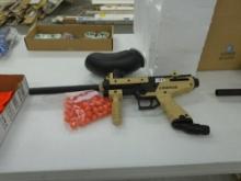paintball gun, cronus brand gun with a bag of paintballs