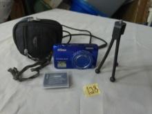 digital camera, nikon coolpix comes with a tripod and extra battery in a samsonite case