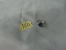 fashion ring, size 7 silver plated ring with large purple stone and small clear stones