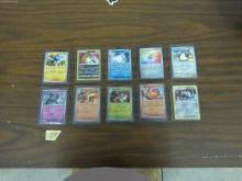 pokemon cards, 10 english holographic cards in mint shape all in hard top loaders