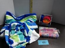 Beach Blanket in a bag, Bubble machine, Rubber band Art