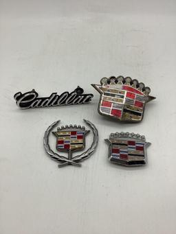 Five Cadillac Car Emblems
