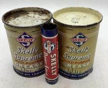 Two Skelly One Pound Grease Cans and Door-Ease Tube