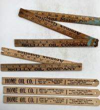 Skelly Folding Yardstick and Three Skelly Home Oil Company Model T Measuring Sticks