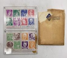 Two Skelly Commemorative Stamp Paperweights