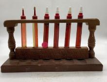 Six Skelly Test Tube Handy Oilers w/ Wood Display
