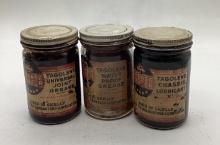 Three Skelly Grease Jars