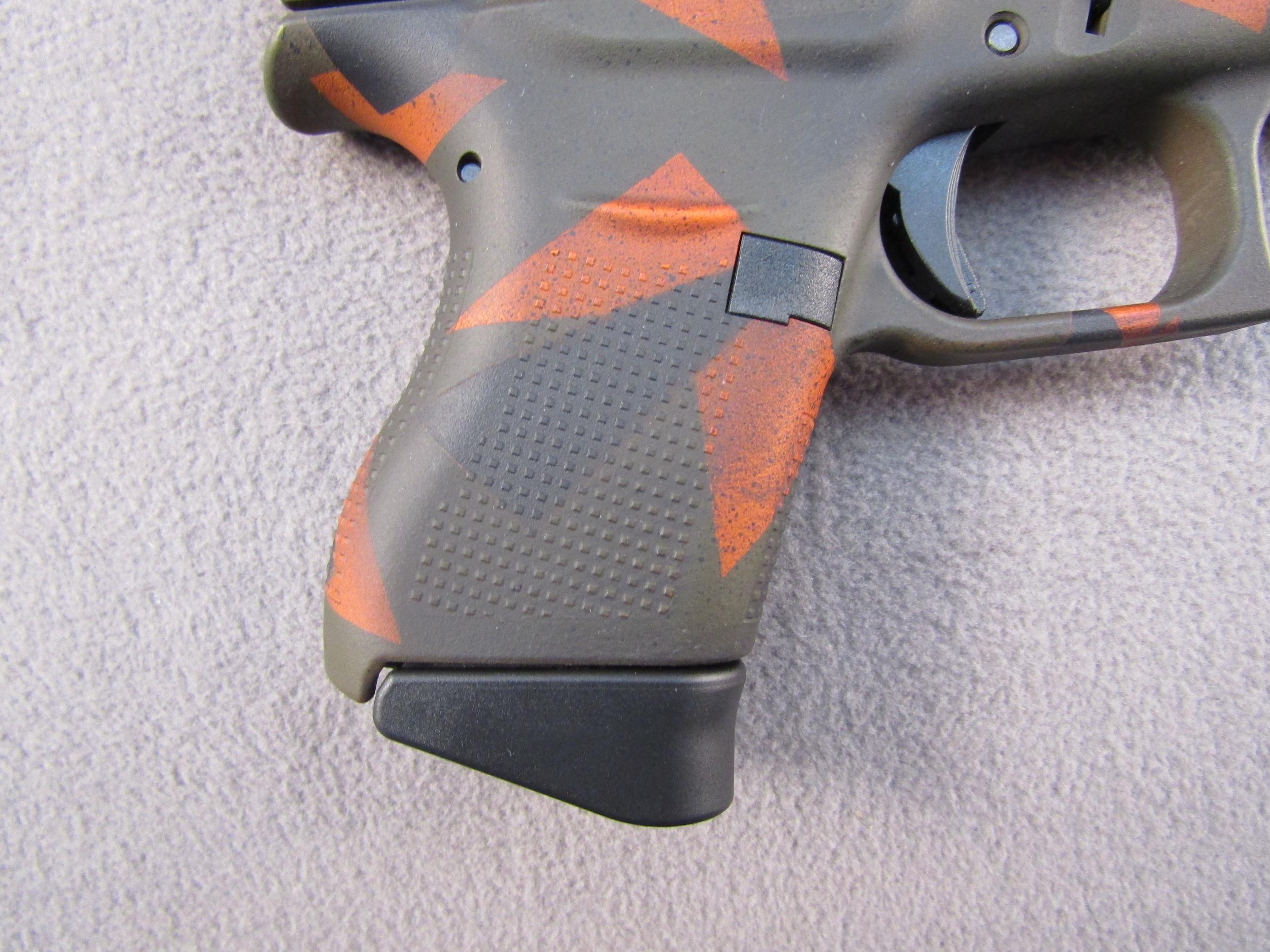 handgun: GLOCK MODEL 43 CAMO, 9X19 SEMI AUTO PISTOL, S#AFCV590