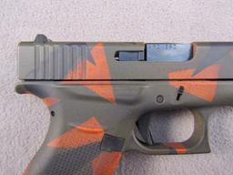 handgun: GLOCK MODEL 43 CAMO, 9X19 SEMI AUTO PISTOL, S#AFCV590