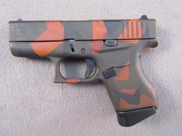 handgun: GLOCK MODEL 43 CAMO, 9X19 SEMI AUTO PISTOL, S#AFCV590