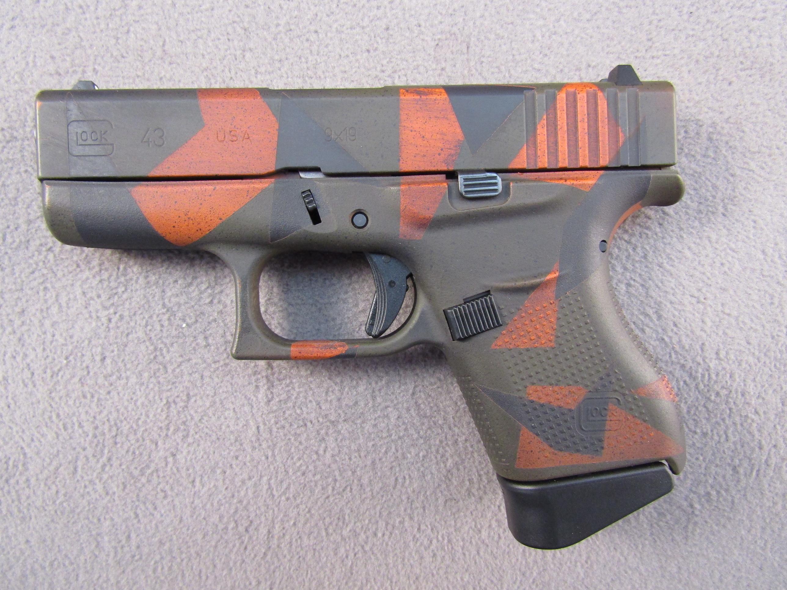 handgun: GLOCK MODEL 43 CAMO, 9X19 SEMI AUTO PISTOL, S#AFCV590