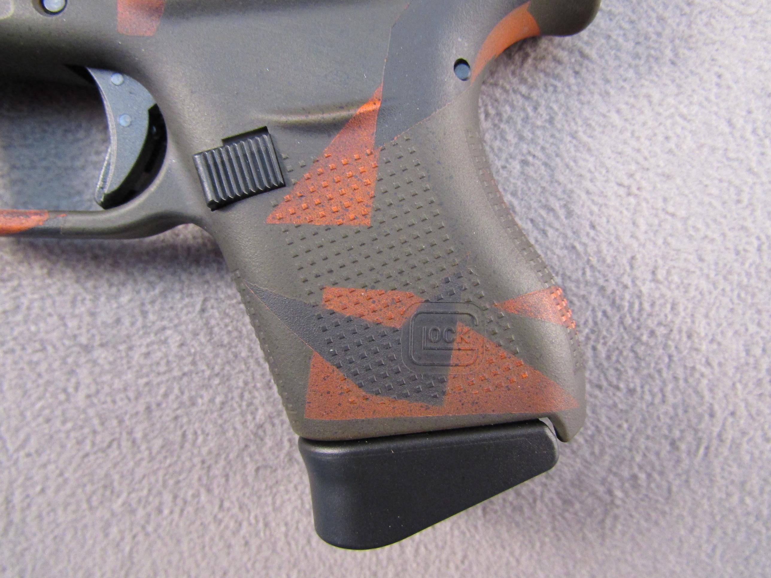 handgun: GLOCK MODEL 43 CAMO, 9X19 SEMI AUTO PISTOL, S#AFCV590