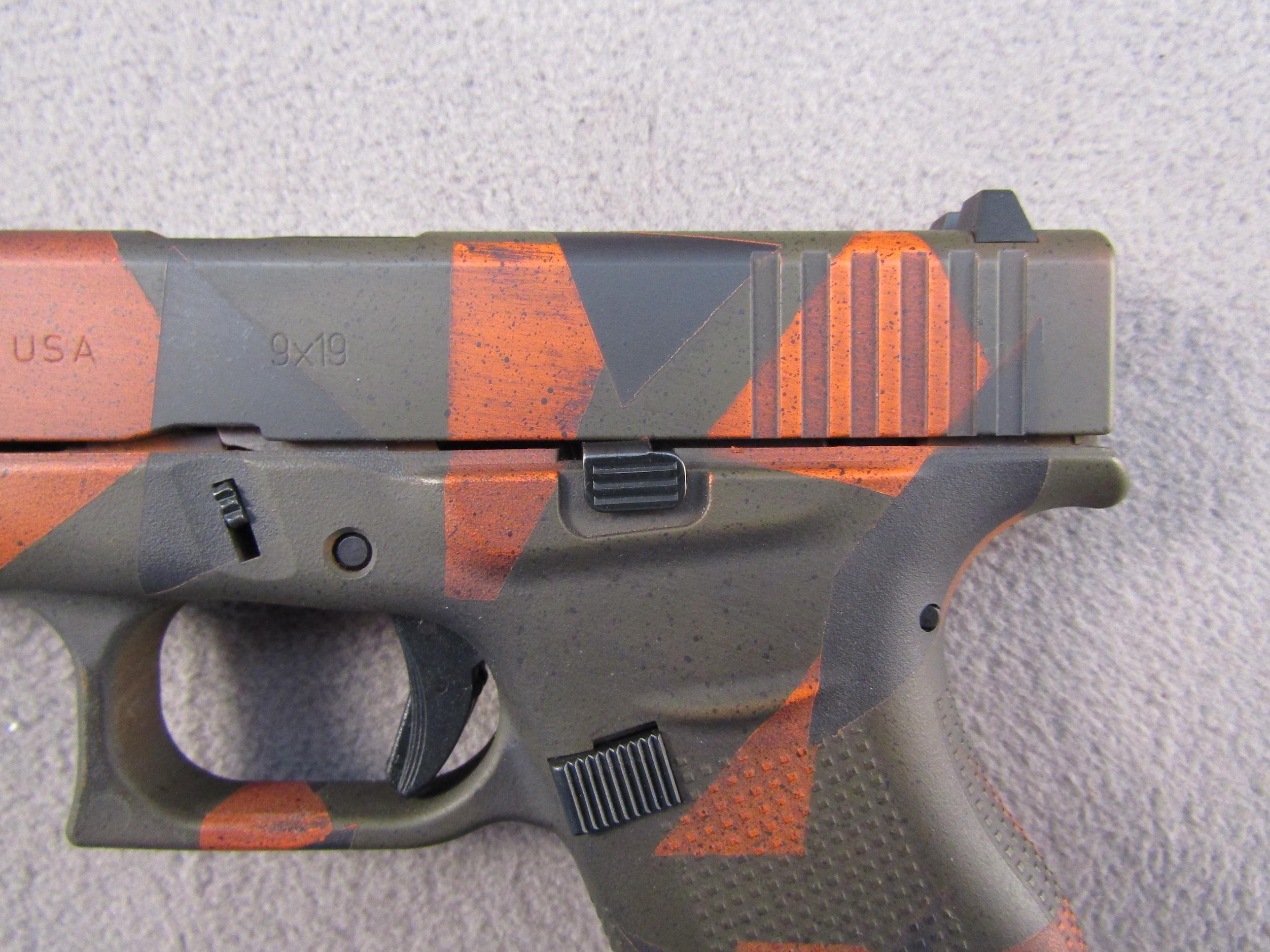 handgun: GLOCK MODEL 43 CAMO, 9X19 SEMI AUTO PISTOL, S#AFCV590