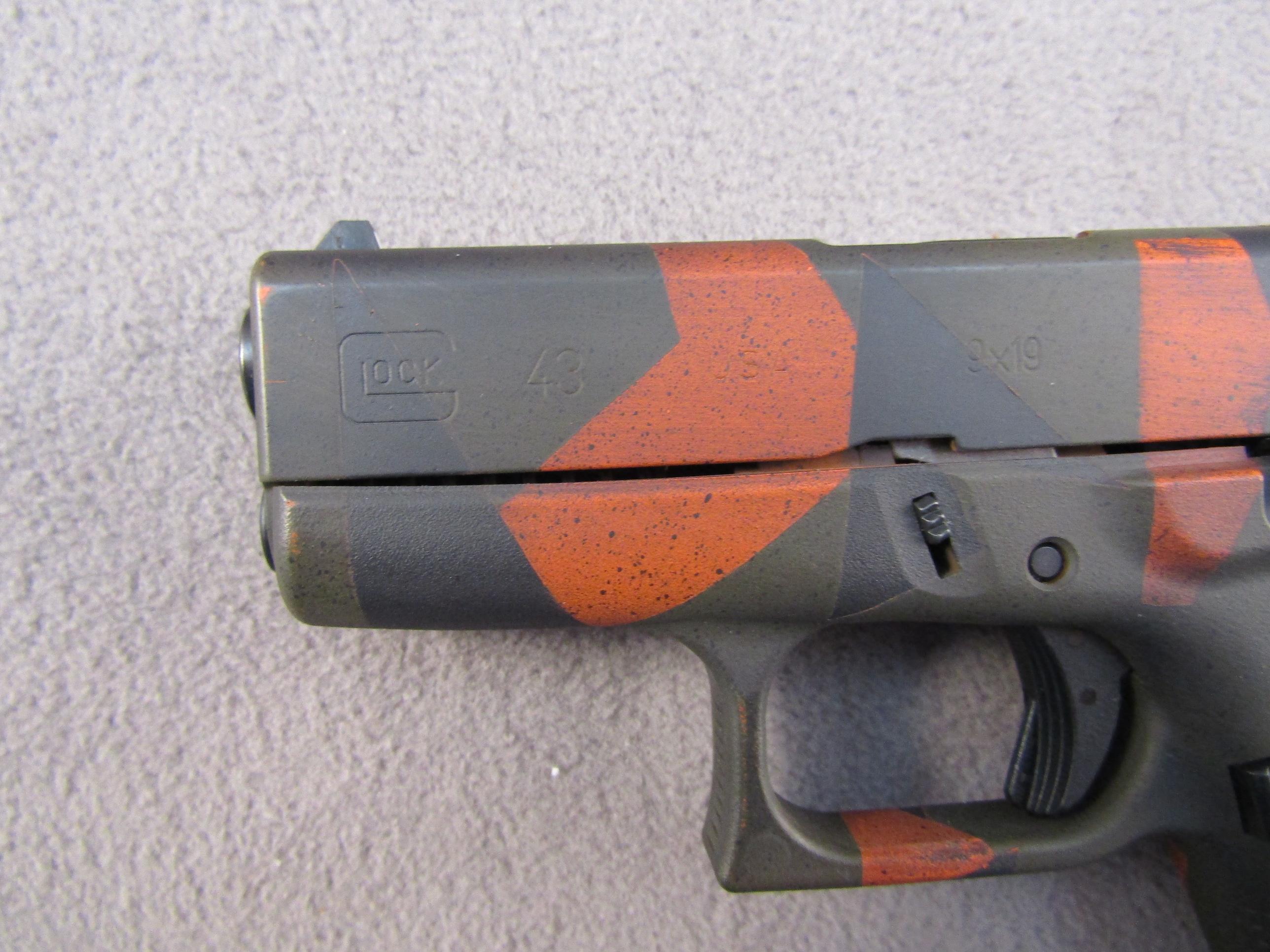 handgun: GLOCK MODEL 43 CAMO, 9X19 SEMI AUTO PISTOL, S#AFCV590
