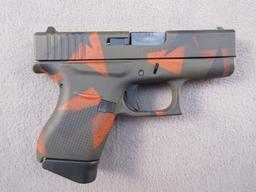 handgun: GLOCK MODEL 43 CAMO, 9X19 SEMI AUTO PISTOL, S#AFCV590