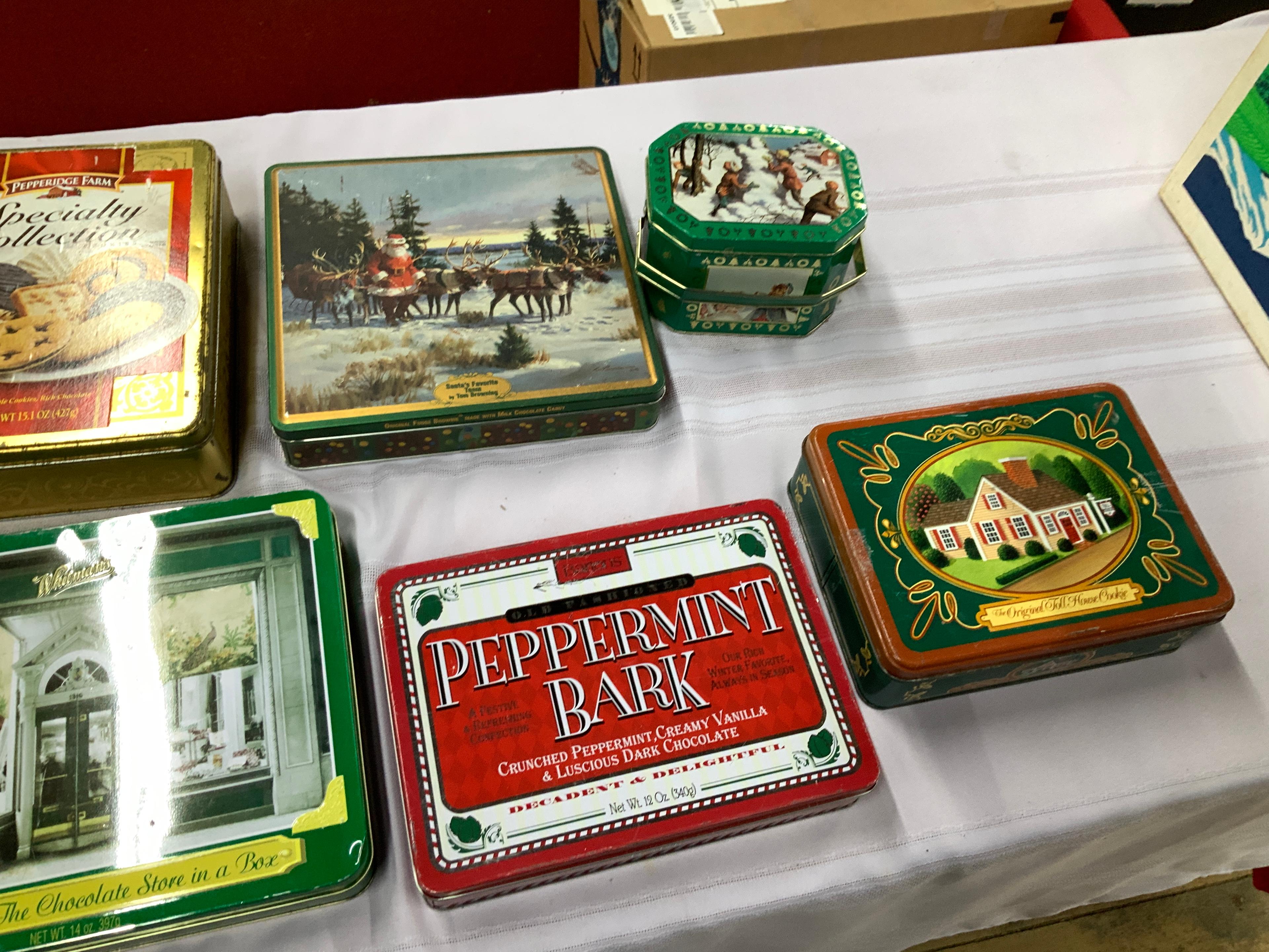 8 Advertising Tins