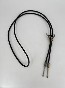 Charles Russell Silver Buffalo Skull Bolo Tie