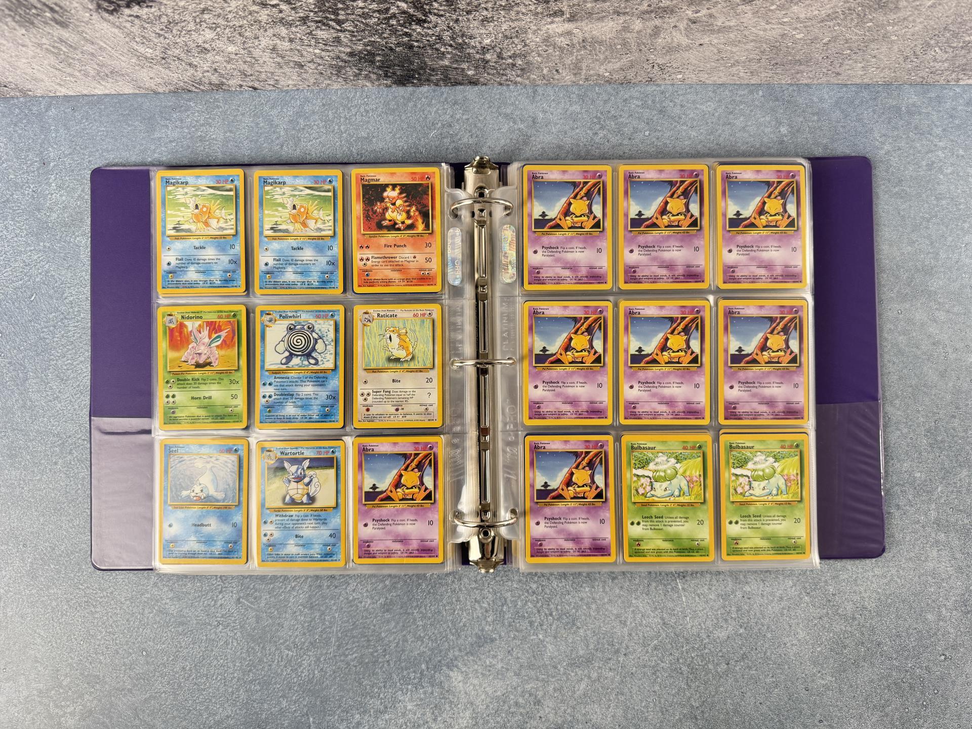 Binder of WOTC Base Set Pokemon Cards
