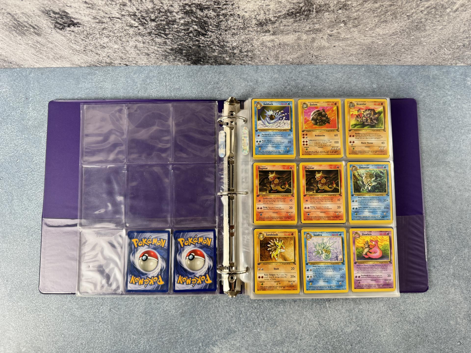 Binder of WOTC Base Set Pokemon Cards
