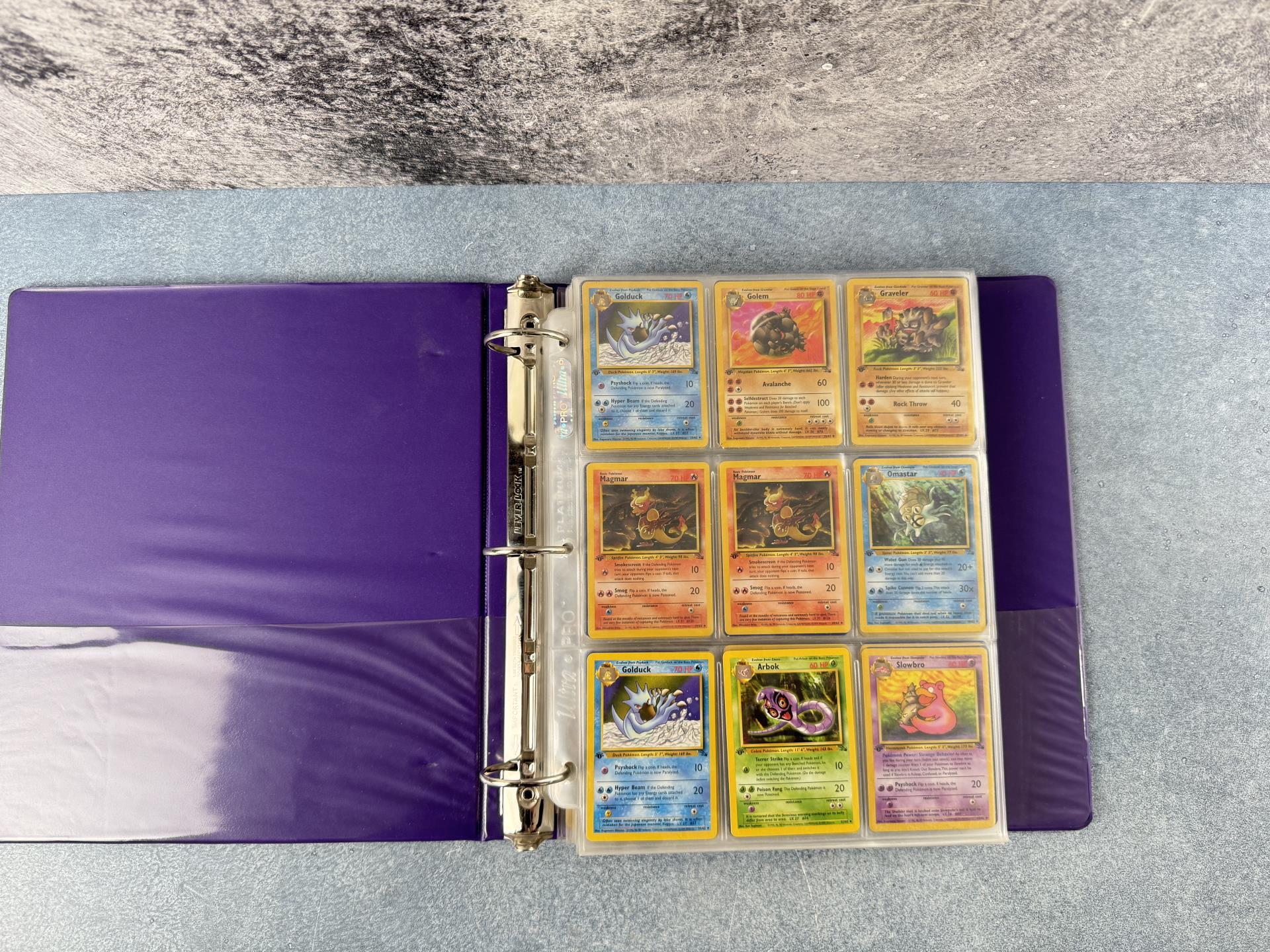 Binder of WOTC Base Set Pokemon Cards