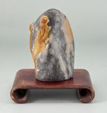 Carved Chinese Stone on Stand.