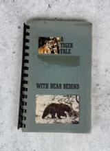 A Tiger Tail With Bear Behind