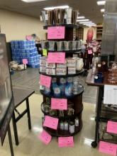 Round Tiered display rack , base 26” wide, 6 shelves,on wheels