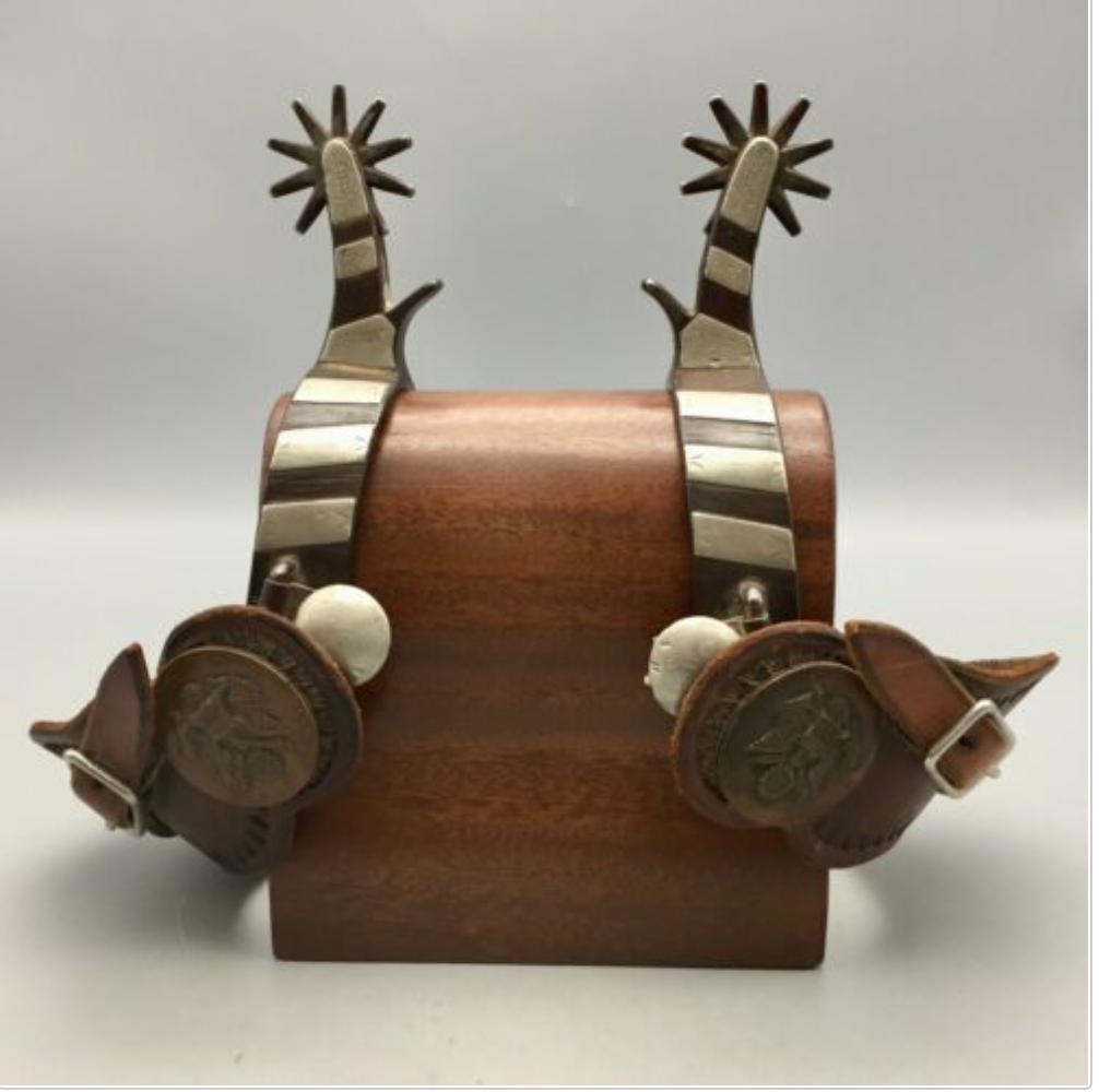 A Rare Pair of Spurs Marked Both KandC and Kelly Bros.