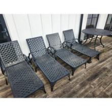 Four Aluminum Loungers and Patio Table