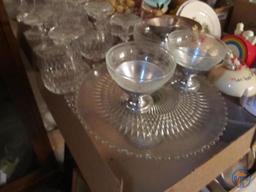 Matching stemware, cake stand, and other dessert dishes