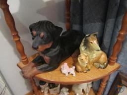 Wood corner shelf, dog picture with hidden door, and dog figurines