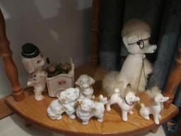 Wood corner shelf, dog picture with hidden door, and dog figurines