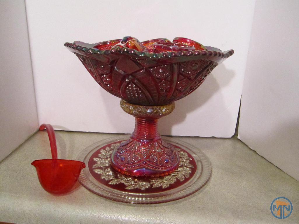 Red carnival glass punch bowl with non matching plate