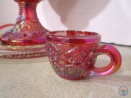 Red carnival glass punch bowl with non matching plate
