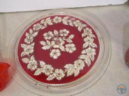 Red carnival glass punch bowl with non matching plate