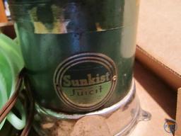 Fire King jadeite cups, Sunkist juicer, cherry syrup dispenser