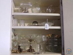 Clear glassware: covered pear dish, lighter, and other dishes