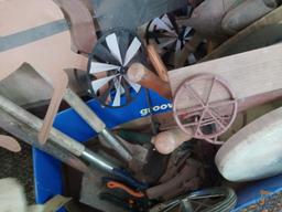 Garden tools: thermometer, seed spreader, waterer, pruners, wall art